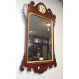 A GEORGE III MAHOGANY FRAMED WALL MIRROR, 73cm high