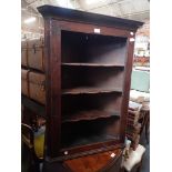 A GEORGE III OAK OPEN HANGING CORNER CUPBOARD