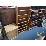 A SMALL STRIPPED PINE CUPBOARD, 37 cm wide, a stripped pine book rack, and two similar shelves