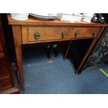 A CONTINENTAL WRITING TABLE fitted two drawers, 82cm wide