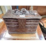 A VICTORIAN BLACK FOREST COMPARTMENTALISED JEWELLERY CASKET, 30cms wide