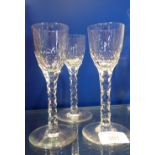 THREE 19TH CENTURY WINE GLASSES with faceted stems, 15.5cm high