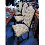 A SET OF EIGHT OAK DINING CHAIRS