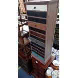 A CONTEMPORARY MAHOGANY CHEST OF EIGHT SQUARE DRAWERS