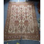 A TURKEY STYLE RUG, 188cms x 265cms, and three other rugs, including Persian style rugs