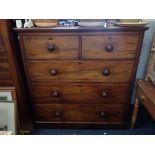 A VICTORIAN MAHOGANY CHEST OF DRAWERS