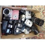AN OLYMPUS OM-1 CAMERA and others similar