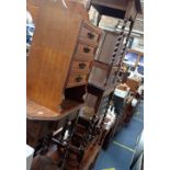 A SPANISH CABINET with a metal grilled door, an oak barley twist table and similar furniture