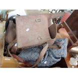 A VINTAGE LEATHER SPALDING PUNCHBAG, a leather satchel and other similar items