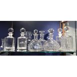A COLLECTION OF DECANTERS AND A WATER JUG