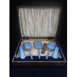 A SILVER AND GUILLOCHE ENAMELED DRESSING TABLE SET