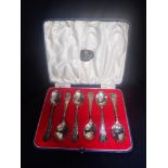 A SET OF SIX GEORGE VI CORONATION SILVER COFFEE SPOONS, in a fitted presentation case