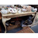 A CREAM AND GILT PAINTED CONSOLE TABLE on cabriole legs