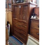 A 19TH CENTURY MAHOGANY CABINET IN THE BIEDERMEIER STYLE