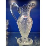 A VICTORIAN CUT GLASS JUG, 28cm high