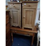 A STRIPPED PINE POT CUPBOARD