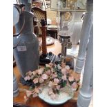 A SILVER PLATED SPRING LOADED 'SHERWOOD LTD' CANDLE LAMP