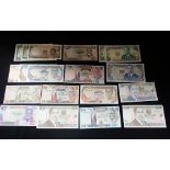 A COLLECTION OF WORLD BANK NOTES, to include a Ten Shilling " Bank Of Tanzania" note