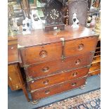 AN EARLY 19TH CENTURY TEAK CAMPAIGN CHEST OF DRAWERS in remarkably original condition, showing signs