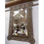 A VICTORIAN BRASS FRAMED WALL MIRROR