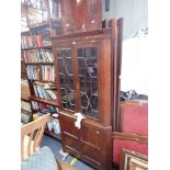 A LARGE GEORGE III GLAZED OAK CORNER CABINET