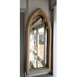 A GOTHIC STYLE RECONSTITUTED STONE GARDEN MIRROR, 90cm high