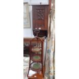 AN ARTS & CRAFTS CARVED OAK WALL CABINET, with pomegranate decoration, 64cm high and an Edwardian ca