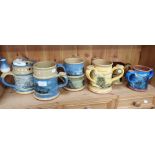 A COLLECTION OF CAMELOT POTTERY TANKARDS (6)
