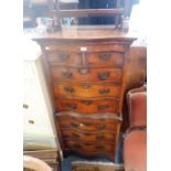 A REPRODUCTION FIGURED WALNUT CHEST ON STAND, 132cm high x 69cm wide