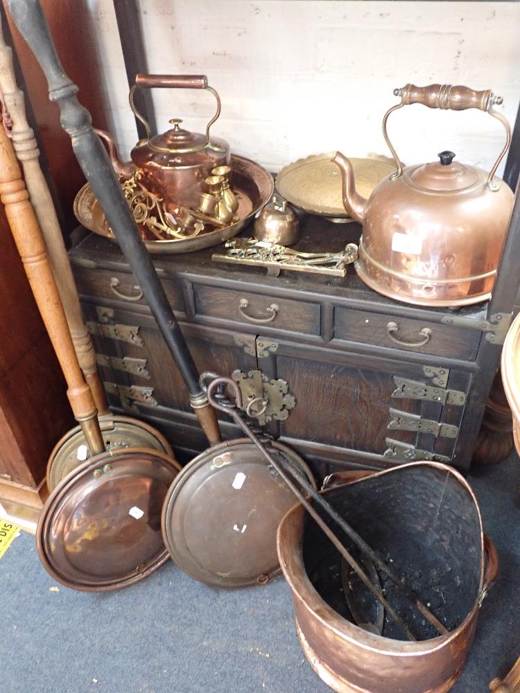 A COLLECTION OF WARMING PANS, a copper kettle and similar metalware