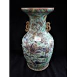 A LARGE CHINESE VASE, decorated with figures on a green ground, 40.5cm high (examine)