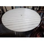 A CIRCULAR WHITE PAINTED GARDEN TABLE, 144cm dia. and two mahogany table bases