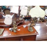 A GILT METAL CHERUB TABLE LAMP and another similar (2)