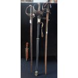 A VICTORIAN DRESS SWORD, another later sword, one similar and a knife (4)
