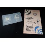 A PAIR OF 1948 OLYMPIC TICKETS with folder and a Wembley 1950 Schools International programme (2)