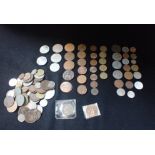 A COLLECTION OF COINS, to include threepences pennies and farthings