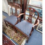 A SET OF SIX MAHOGANY CHIPPENDALE STYLE DINING CHAIRS with drop-in seats