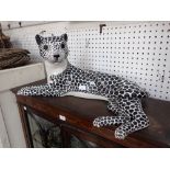 A LARGE CERAMIC STUDY OF A LEOPARD, 73cm long