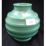 KEITH MURRAY; A WEDGWOOD ART DECO MATT GREEN VASE, 15.5cm high