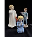 A ROAL DOULTON FIGURE, 'DARLING', a Worcester figure , 'The Parakeet' and a Western German figure (3