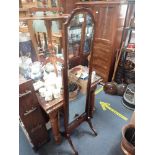 AN EDWARDIAN MAHOGANY CHEVAL MIRROR, height 157cm, width 42cm