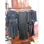 A VINTAGE LADIES BLACK CREPE JACKET, with similar black vintage dresses, circa 1920s/30s