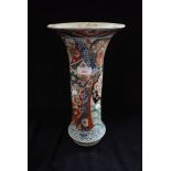 AN IMARI VASE with traditional decoration, 40cm high (examine)