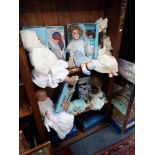 A LARGE COLLECTION OF BISQUE HEADED DOLLS, to include a 'HRH Prince William' doll (boxed)