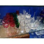 A COLLECTION OF CRANBERRY GLASSES, a rinser and 19th century glassware