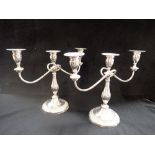 A PAIR OF SILVER PLATED CANDELABRA