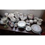 A SET OF THREE GRADUATED COALPORT MASK-HEAD JUGS, a Sunderland lustre jug (examine) and similar cera