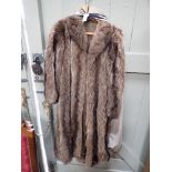 A VINTAGE LADIES FULL LENGTH FUR COAT