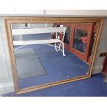 A LARGE 19TH CENTURY GILT FRAMED MIRROR, 105cm high x 133cm wide