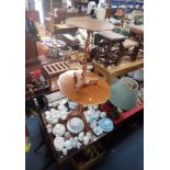 A GEORGIAN STYLE TRIPOD TABLE, ANOTHER DISPLAY TABLE and an extending dining table (3)